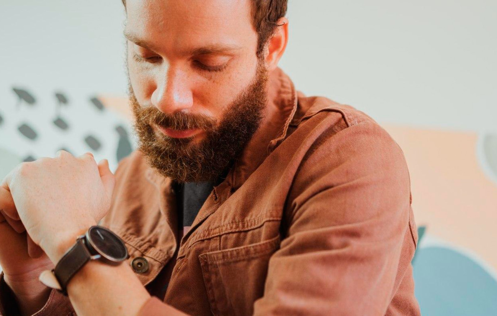 Photo by Creative Christians man in brown button up shirt wearing black sunglasses
