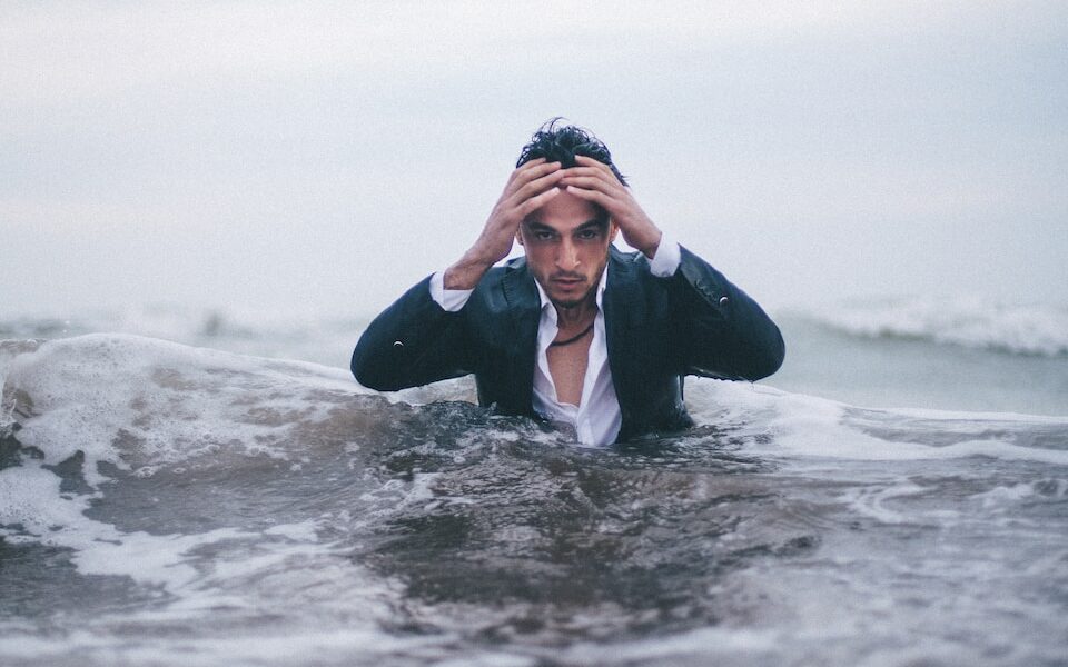 man on body of water during daytime