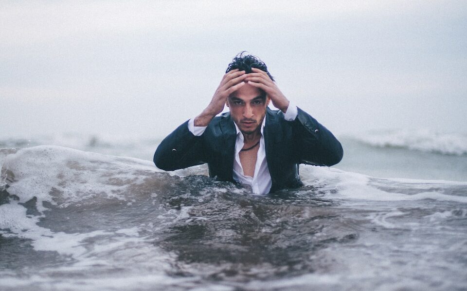 man on body of water during daytime