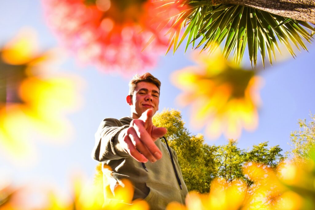 a man pointing at something in the air