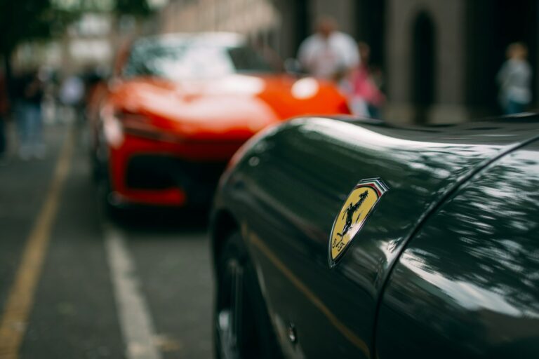 Two cars parked on the side of the road